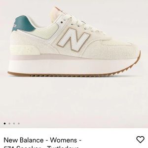 New Balance 574 platform sneakers in Turtledove cream with green accent